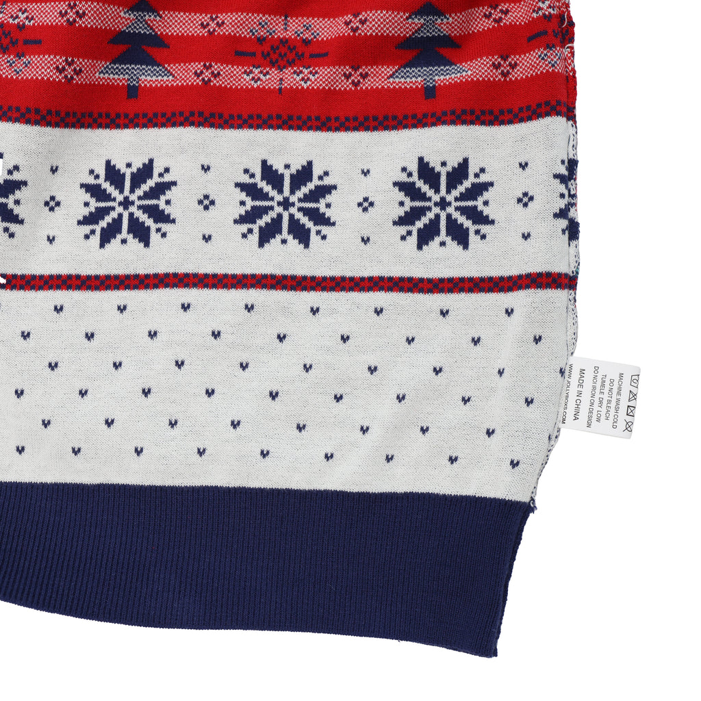 Close-up of an ugly christmas sweater with red, white, and blue pattern on a white background