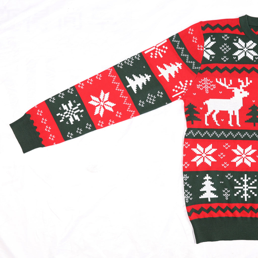 Christmas-themed ugly sweater with reindeer, trees, and snowflakes on a white background