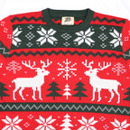 Red ugly Christmas sweater with reindeer, trees, and snowflakes on a white background