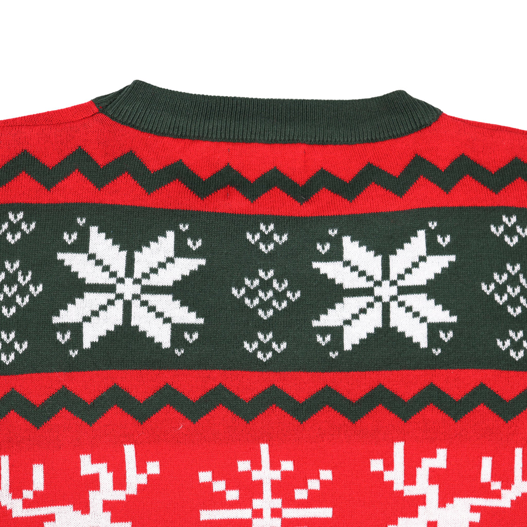 Close-up of a red and green ugly christmas sweater with snowflake pattern