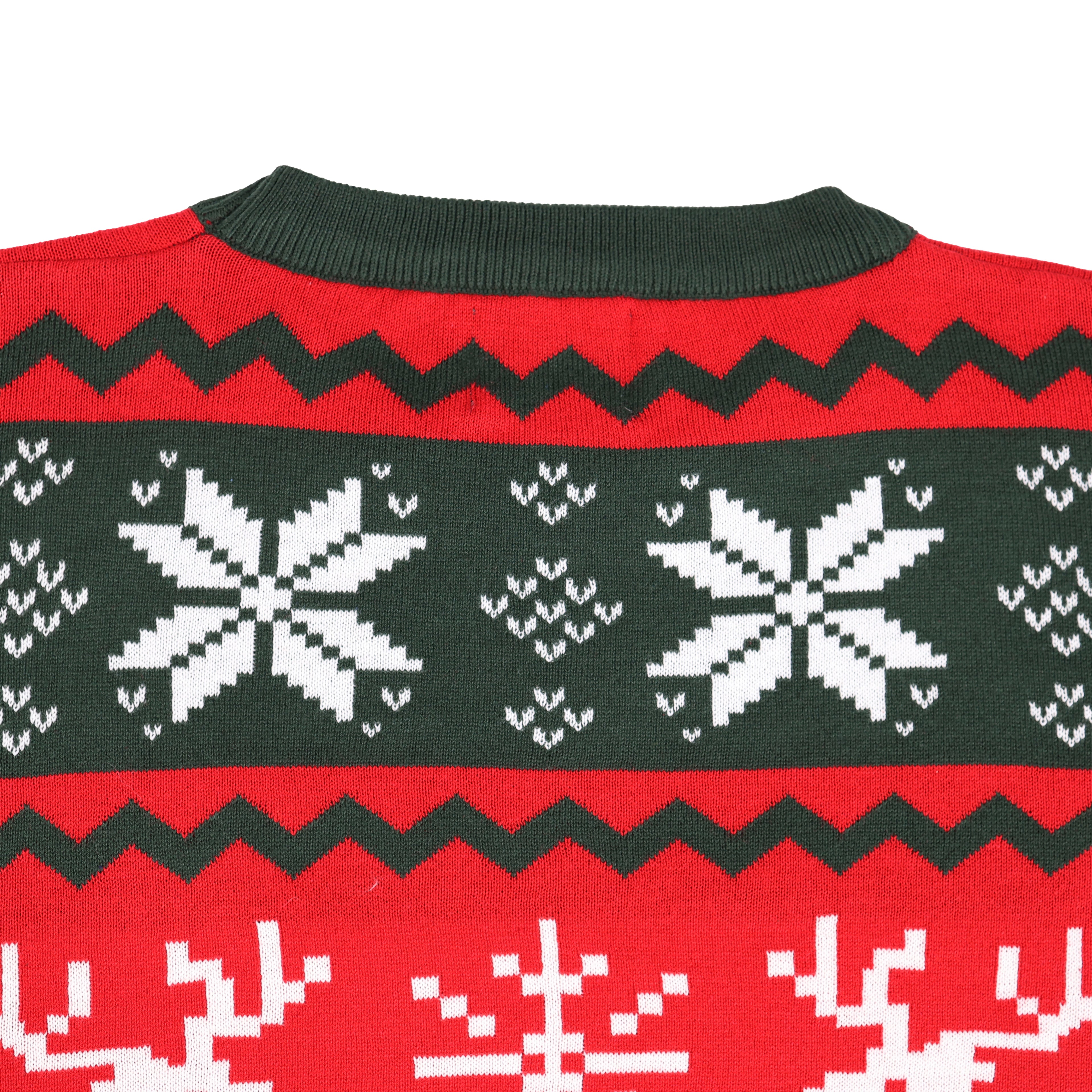 Close-up of a red and green ugly christmas sweater with snowflake pattern
